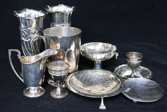 A pair of early 20th century repousse silver vases and sundry other items including silver dish and egg cup.